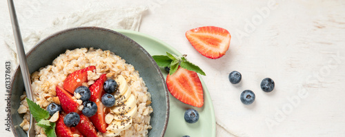 Healthy homemade oatmeal with berries for breakfast.