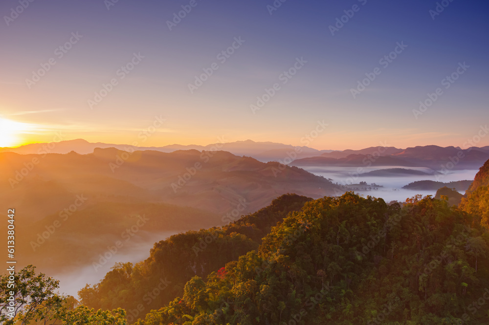 Beautiful aerial view landscape sunbeam with fog at morning, Phu Pha Mok viewpoint. Mae Hong Son, Baan JABO one of the most amazing Mist in Thailand.