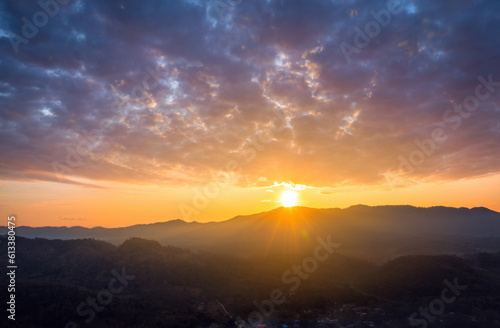 View from drone high angle. Beautiful view of the morning scenery. Golden light. Sunrise. And beautiful clouds, Ban Pang Puai, Mae Moh, Lampang, Thailand. © 24Novembers