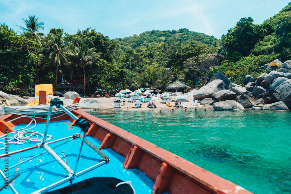  traveling on a long-tail boat on the bay at Koh Tao