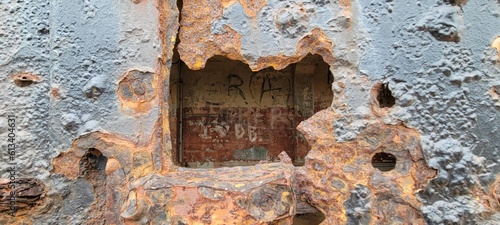 old rusty door hole