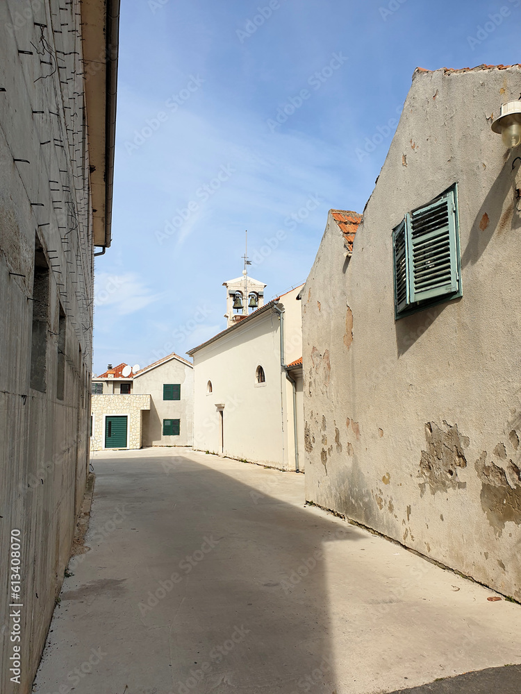 street leading towards old church St. Roko located in Bibinje, Croatia