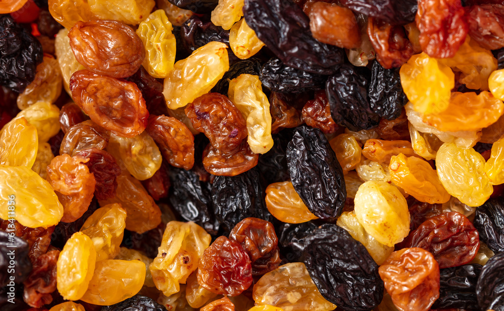 Multicolored raisins as a background. Macro Multicolored raisins as a background. Macro