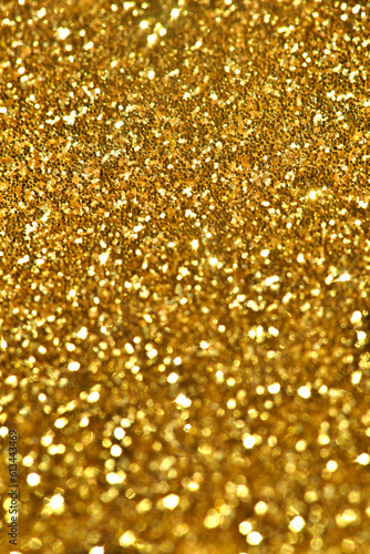Golden shining yellow gold glitter texture background