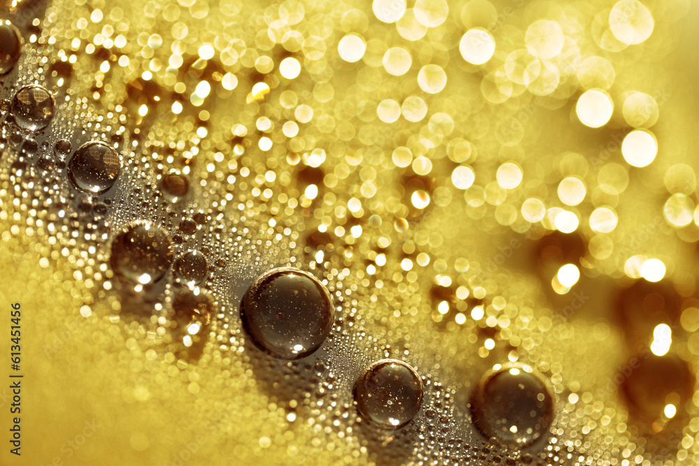 Water drops. Macro of water particles on flat surface. Abstract background in yellow tones. Water drops. Macro of water particles on flat surface. Abstract background in yellow tones.
