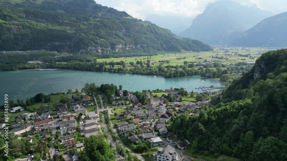 Drone view of the Walensee lake and housing near Weesen, Switzerland Drone view of the Walensee lake and housing near Weesen, Switzerland