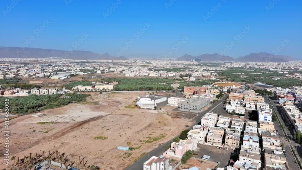 Medina, Saudi Arabia: Aerial view of famous city in Arabia, buildings in Arabic style - landscape panorama of Arabian Peninsula from above Medina, Saudi Arabia: Aerial view of famous city in Arabia, buildings in Arabic style - landscape panorama of Arabian Peninsula from above