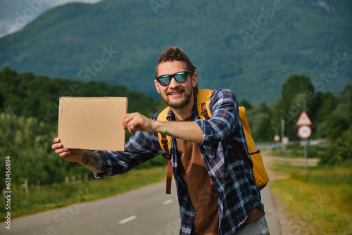 Fotografija Guy went on trip alone, trying to stop passing car