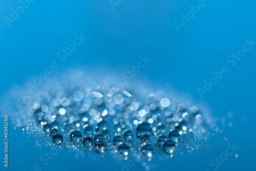 Water drops.Abstract blue background .Defocused background water drops. Blurred bokeh background.