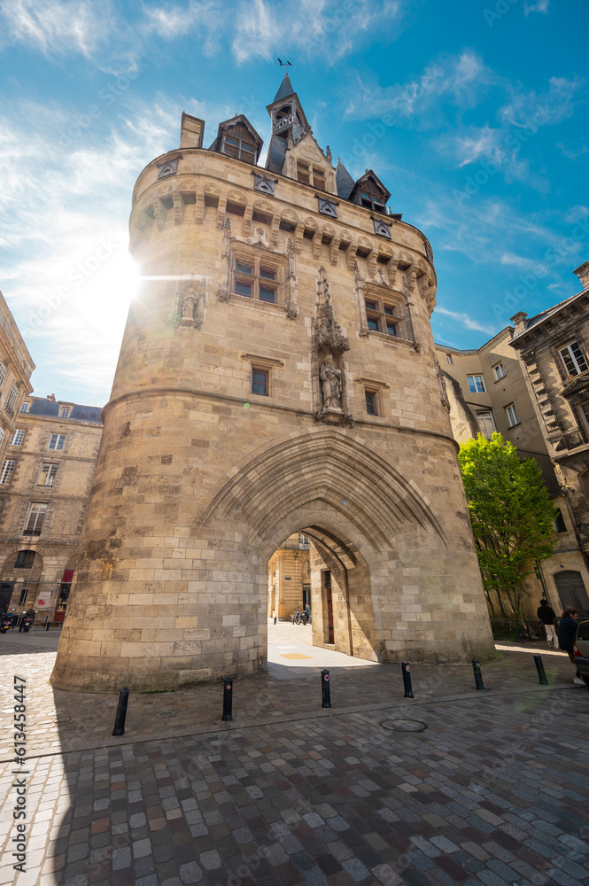 The door or gate Porte Cailhau is beautiful gothic architecture from the 15th century. It is both a defensive gate and triumphal arch. Bordeaux, France. High quality photography.