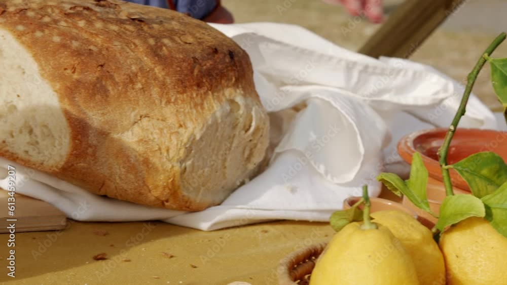 baker's counter with traditional fresh bread, fruit and ears of wheat baker's counter with traditional fresh bread, fruit and ears of wheat