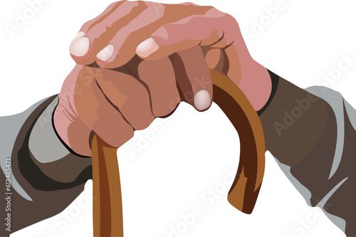 hands of elderly person with support stick-