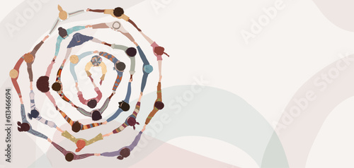 Group of people in circle from diverse culture holding hands.Teamwork and cooperation.Community of friends or volunteers committed to social issues for peace and the environment.Top view