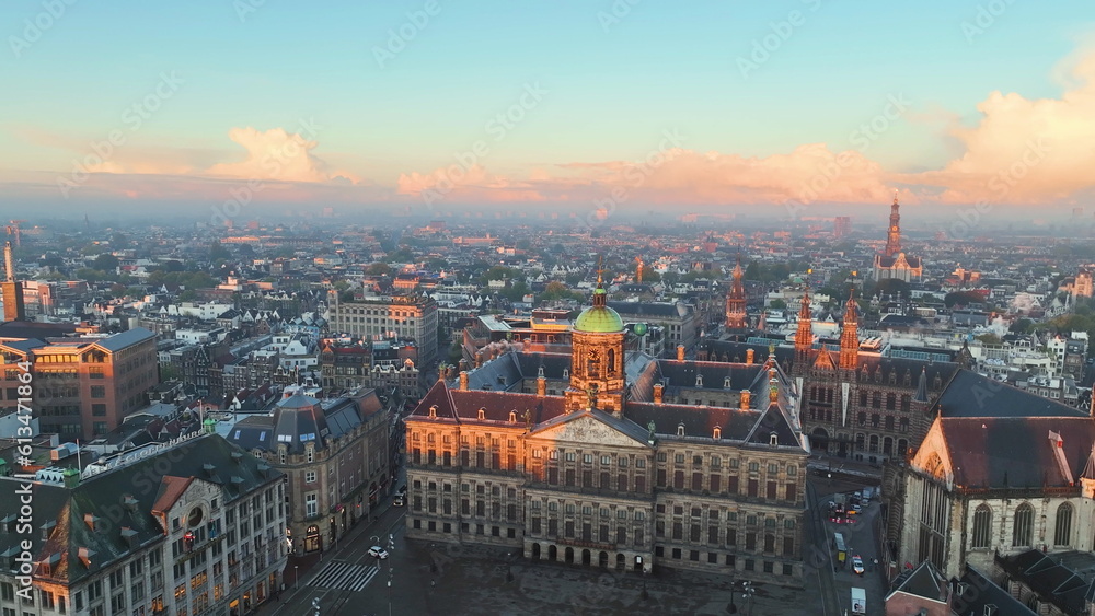 4k Aerial view of famous places Amsterdam, Netherlands. View of canal and old centre district. Koninklijk Paleis Amsterdam view at sunrise