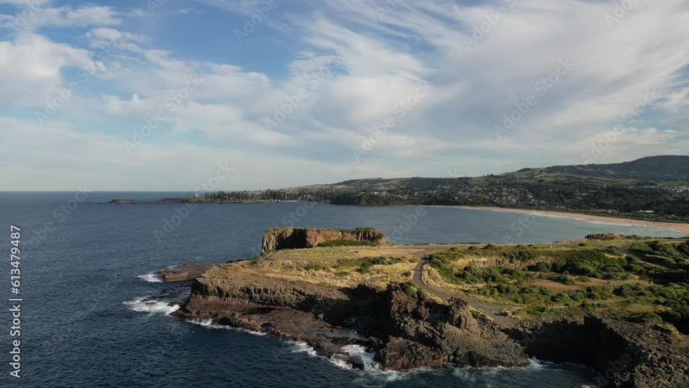 Mind, body, soul and peaceful sky drone view of natural rock formation along empty beach with ocean sea water wave Mind, body, soul and peaceful sky drone view of natural rock formation along empty beach with ocean sea water wave