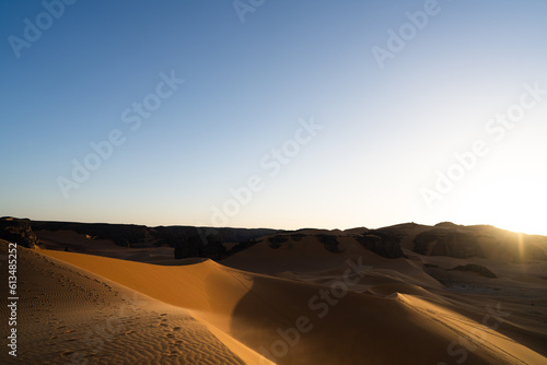 view in the Sahara desert of Tadrart rouge tassili najer in Djanet City   Algeria.colorful orange sand  rocky mountains