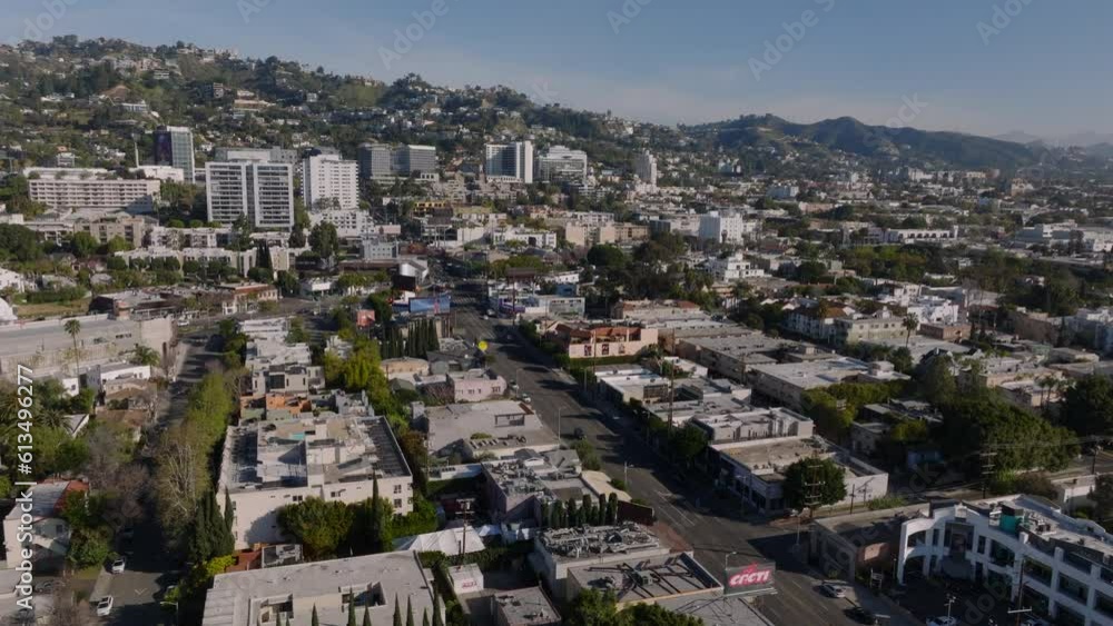 Aerial shot of buildings in city on sunny day. Various houses in urban borough. Los Angeles, California, USA Aerial shot of buildings in city on sunny day. Various houses in urban borough. Los Angeles, California, USA