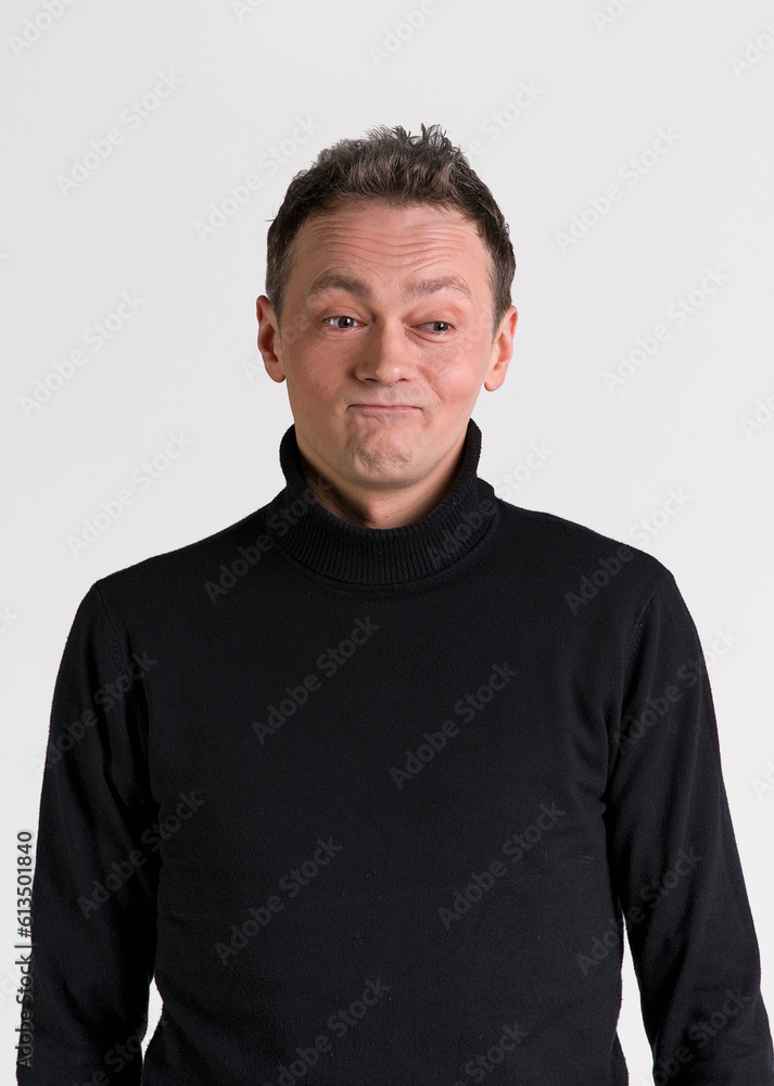 handsome emotional funny men in black sweater on white background handsome emotional funny men in black sweater on white background