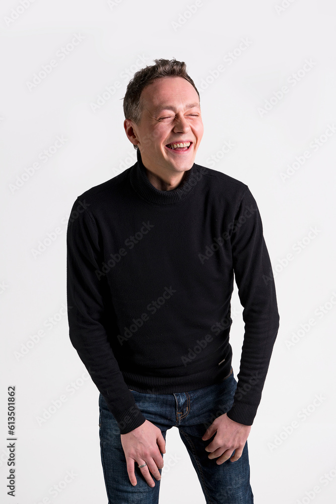handsome emotional funny men in black sweater on white background handsome emotional funny men in black sweater on white background