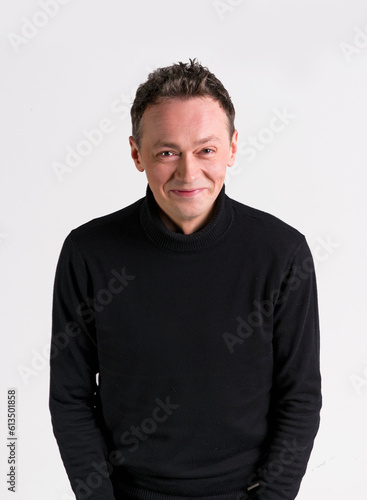 handsome emotional funny men in black sweater on white background