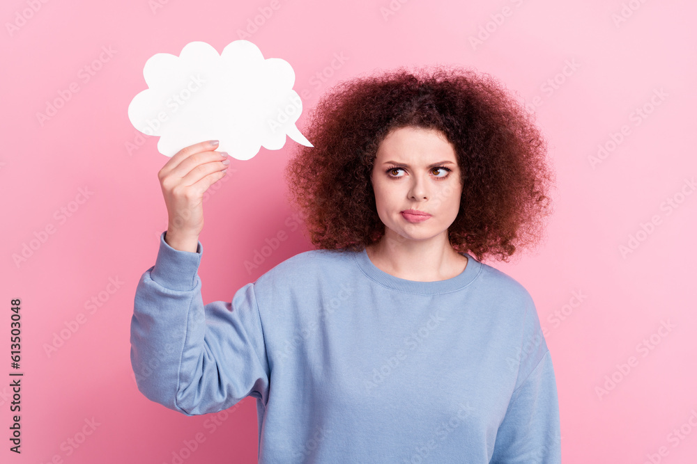 Photo of young think girl wear blue trendy shirt hold paper bubble cloud empty space idea brainstorming isolated on pink color background Photo of young think girl wear blue trendy shirt hold paper bubble cloud empty space idea brainstorming isolated on pink color background