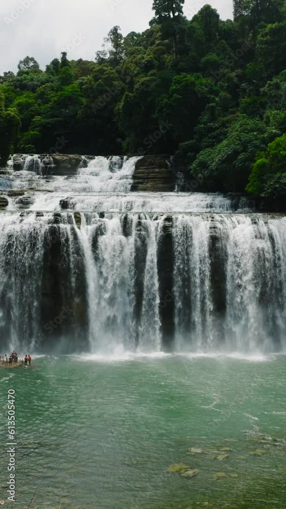 Aerial drone survey of tourist people in Tinuy an Falls. Mindanao, Philippines. Vertical view. Aerial drone survey of tourist people in Tinuy an Falls. Mindanao, Philippines. Vertical view.