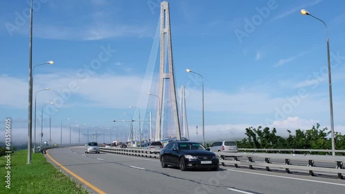  Cars drivind along the Cable-stayed Russky Bridge to island Russkiy in Vladivostok, Primorsky Krai, Russia