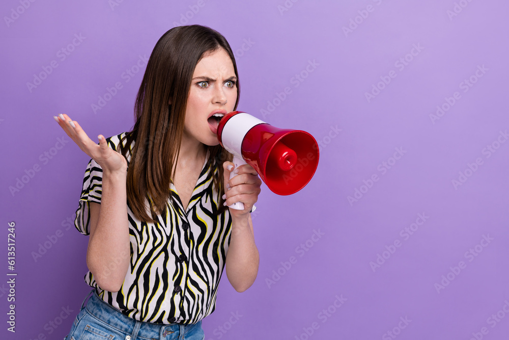 Photo of young funny woman furious scream bullhorn angry mood conflict empty space bad mood activist isolated on violet color background Photo of young funny woman furious scream bullhorn angry mood conflict empty space bad mood activist isolated on violet color background