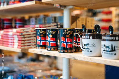 Tromso, Norway 10.6.2023: Cups with Norway flags sold as souvenirs