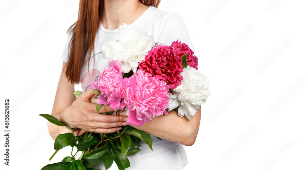 beautiful peonies in the hands of a girl on a white background