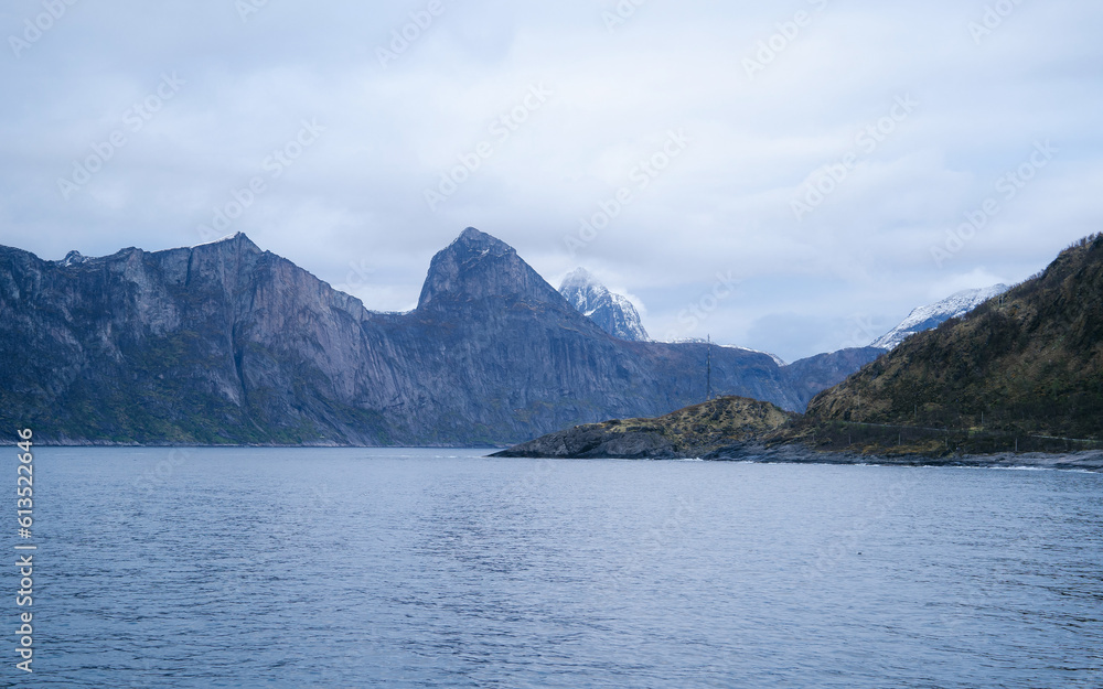 Rainy clouds over a fjord on Senja island in Norway