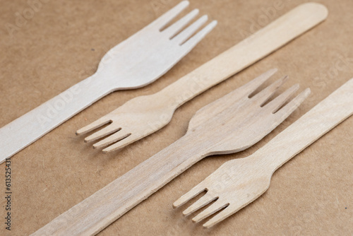 wooden cutlery and paper straws 