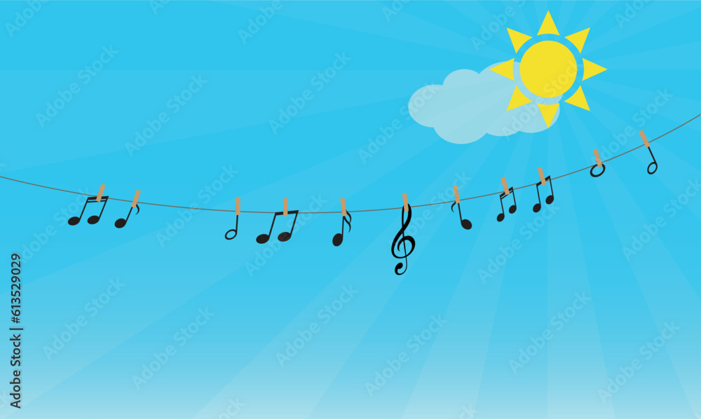 Musical notes and treble clef hanging on a rope against blue sky