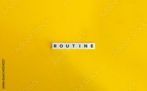 Routine Word on Letter Tiles on Yellow Background. Minimal Aesthetics.