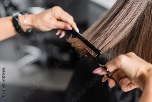 Obraz close up of scissors and comb, salon hair tools, cropped view of professional hairdresser cutting short brunette hair of woman, beauty worker, haircut, beauty salon work, hairdo
