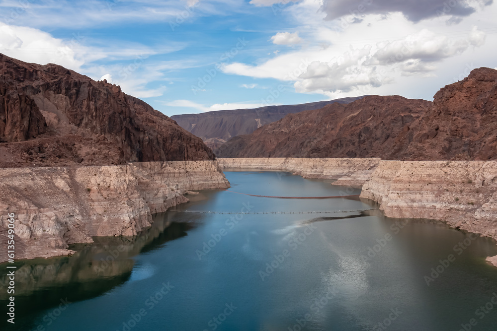 Scenic view of Colorado River seen from Hoover Dam near Mike O'Callaghan Pat Tillman Memorial Bridge, Nevada Arizona, USA. Blue turquoise water from Lake Mead surrounded by River mountain range