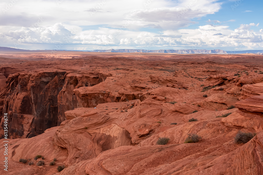 Panoramic aerial view of geological rock formations near Horseshoe bend of Colorado river near Page in summer, Arizona, USA United States of America. Sandstones in Glen Canyon National Recreation Area Panoramic aerial view of geological rock formations near Horseshoe bend of Colorado river near Page in summer, Arizona, USA United States of America. Sandstones in Glen Canyon National Recreation Area
