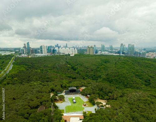 Photography Aerial view of Istanbul Business District above forest with a concert arena