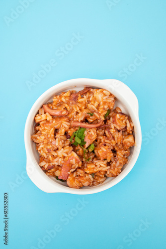 Typical portuguese dish rice with octopus in bowl photo