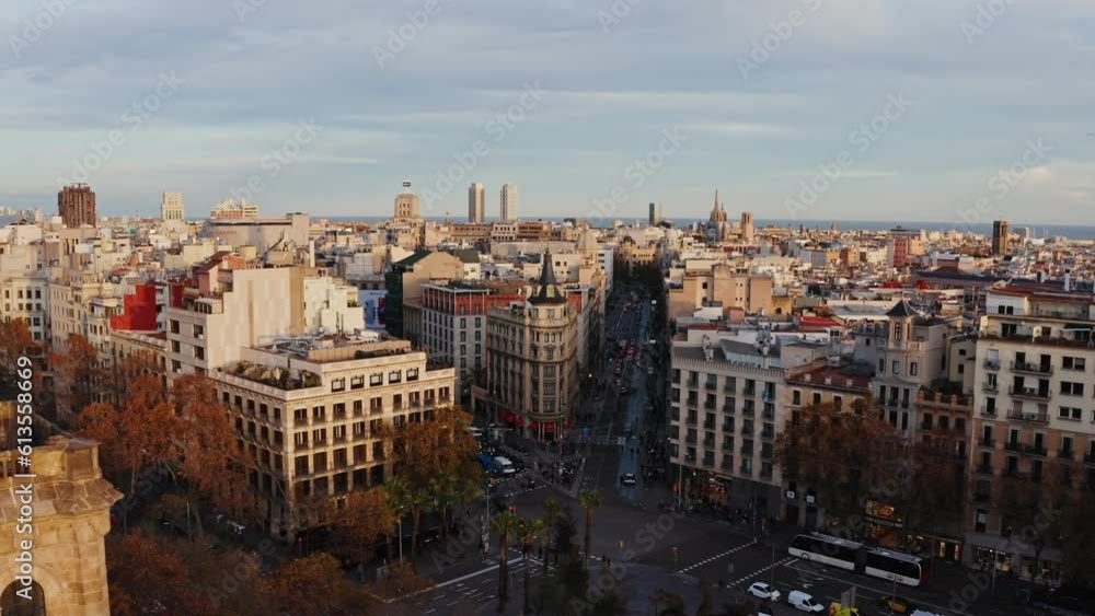 Panoramic bird's-eye view of Barcelona. Drone movement over a busy road junction in the city center Panoramic bird's-eye view of Barcelona. Drone movement over a busy road junction in the city center