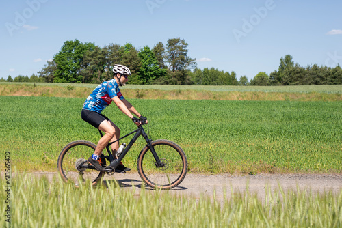 Fototapeta Naklejka Na Ścianę i Meble -  A man on a mountain bike.
