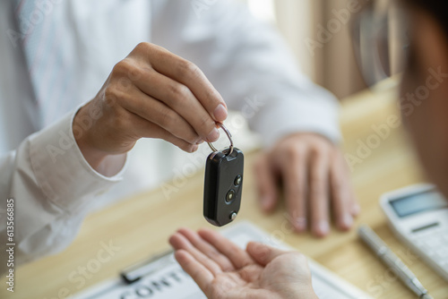 Loss Adjuster Insurance Agent Inspecting Damaged Car. .Sales manager giving advice application form document considering mortgage loan offer for car  insurance