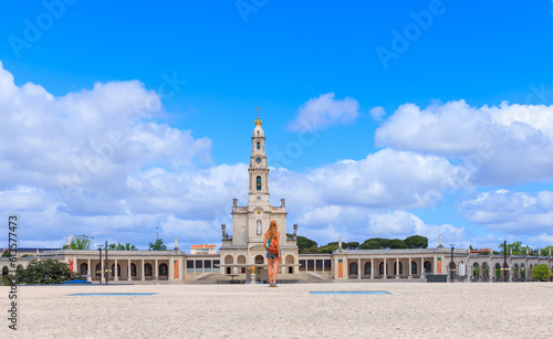 Woman tourist in Fatima city landscape- Famous Basilica pilgrim,  Portugal
