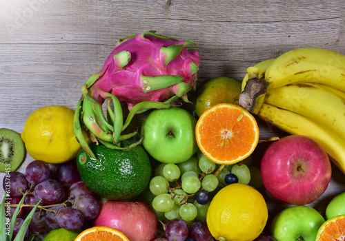 Fototapeta Naklejka Na Ścianę i Meble -  assorted fruits, top view healthy food concept Including high vitamin fruits, fresh fruits, tropical fruits