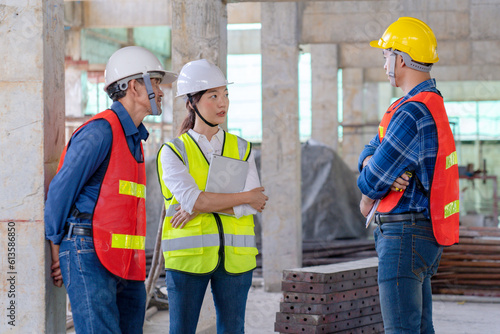 team of civil technician engineers discuss the timeline with architect foreman worker while inspecting, check safety infrastructure construction progress for sustainable green building at project site