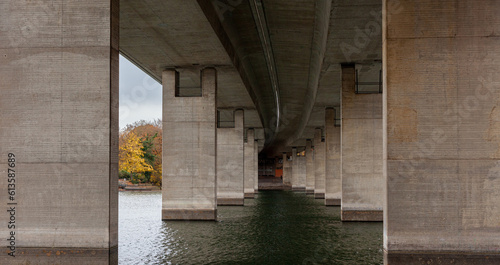 Canvas Print Bridge over the river in autumn, close-up view of the bridge