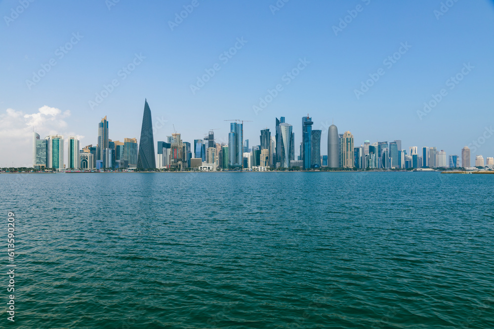 Doha, Qatar - January 26 2023: A view of the sea and the towers in Doha, one of the most beautiful tourist places in Qatar Doha, Qatar - January 26 2023: A view of the sea and the towers in Doha, one of the most beautiful tourist places in Qatar