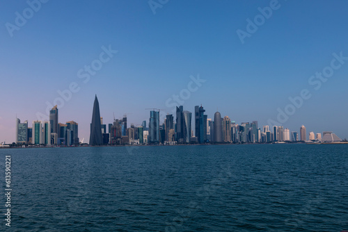 Doha, Qatar - January 26 2023: A view of the sea and the towers in Doha, one of the most beautiful tourist places in Qatar  © Salim