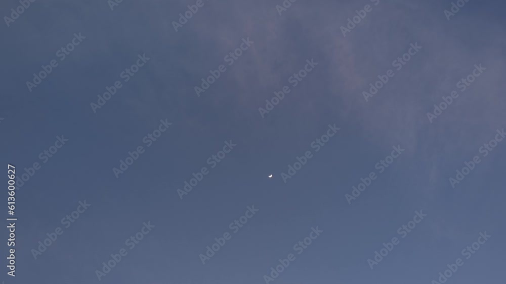 The massive pink and orange cloud leaves to leave in its place the moon alone The massive pink and orange cloud leaves to leave in its place the moon alone