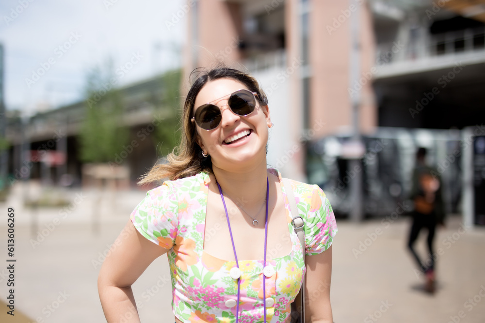 happy tourist in city of Lyon with sunglasses at train station happy tourist in city of Lyon with sunglasses at train station